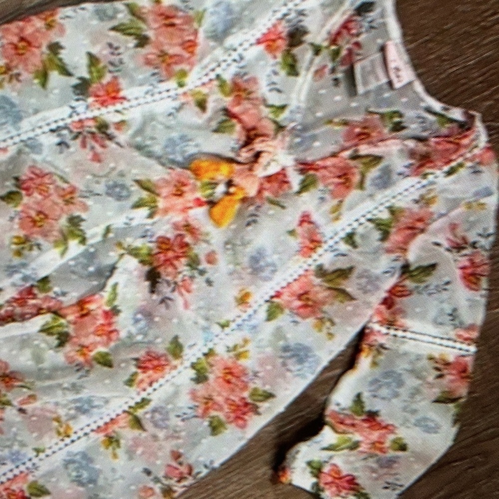 Charming floral top with bow detail